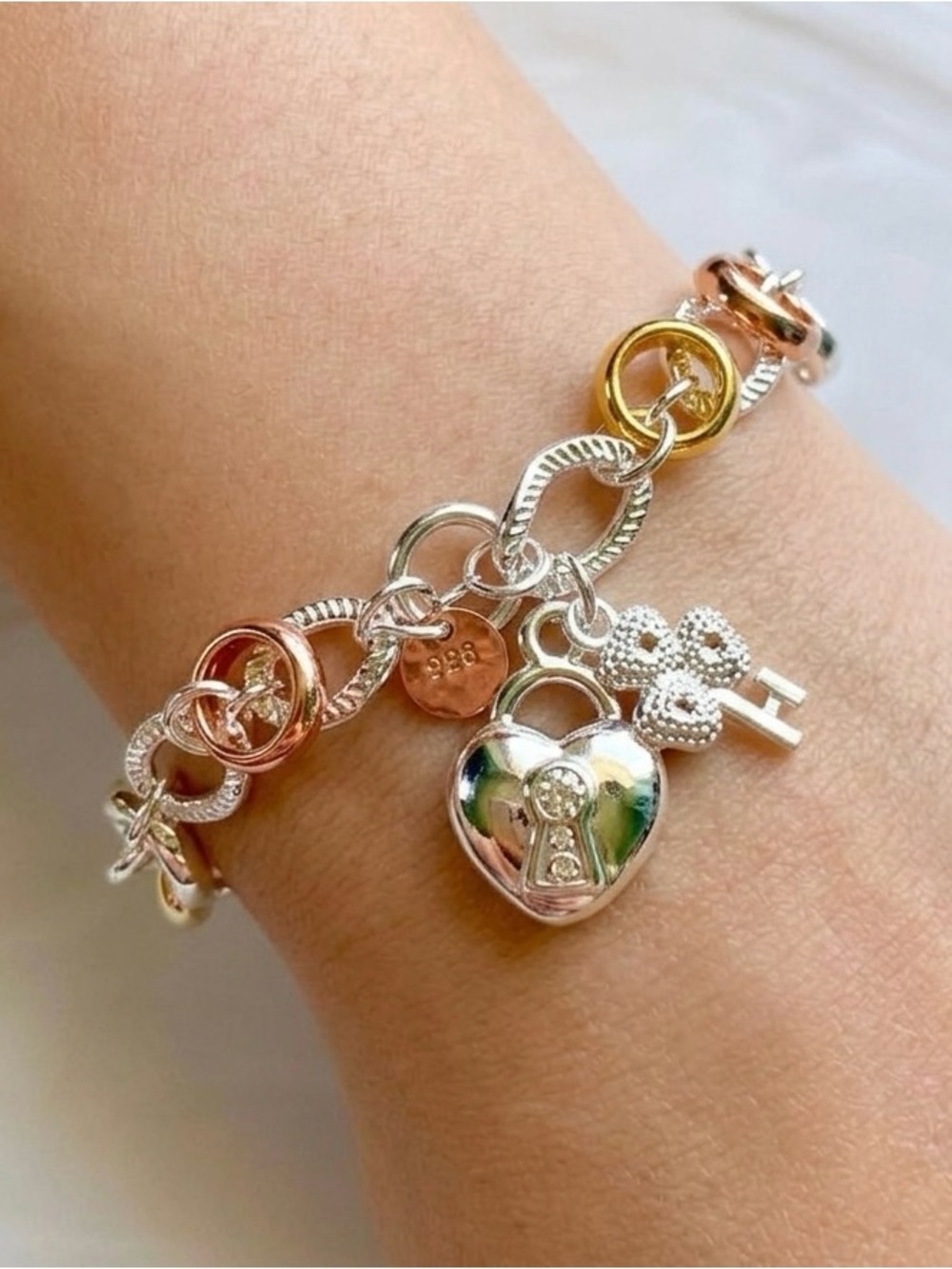 Tri-Tone Silver Bracelet with Heart Lock Charm